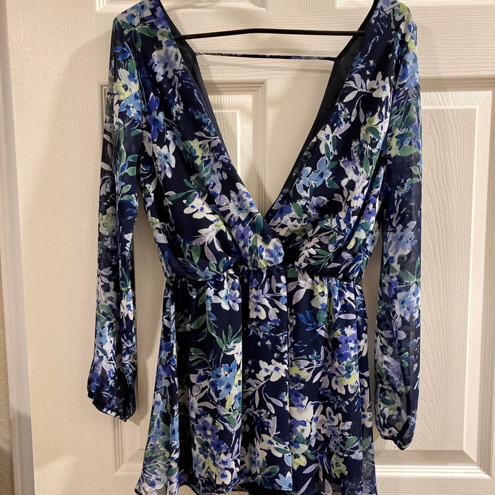 Navy blue long sleeve romper with flower detail
